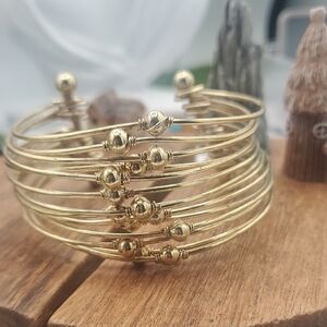 Gold Tone Cuff Lace Melt Bracelet  Overflow